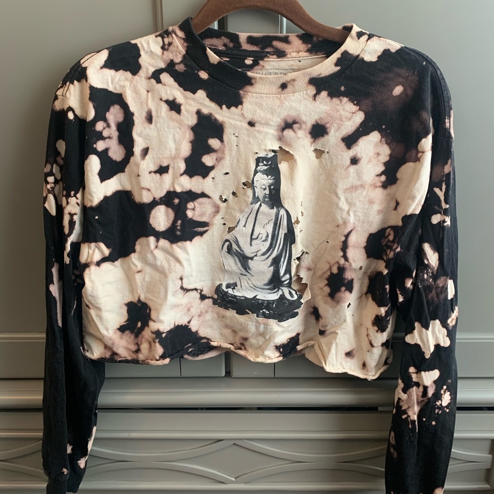 Bleached out distressed tshirt with Tibetan design